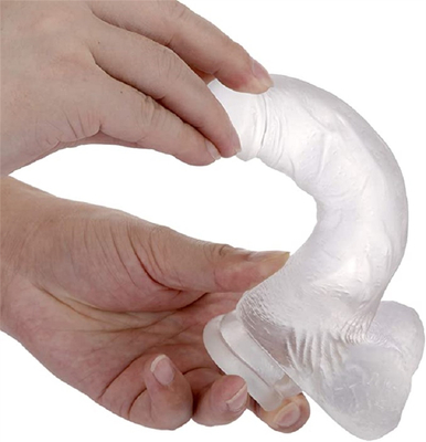 Realistyczne dildo wygląda jak czysty dildo z pojemnikiem do gry bez rąk